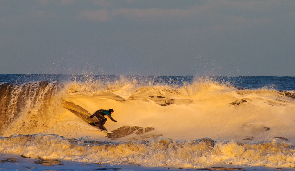 Winter on the Outer Banks means north swells. North swells mean Lighthouse barrels. If the Lighthouse is barreling, Brett Barley will be on it. This isn\'t anywhere near a big one, but the golden hour light and the slicing of the frothing foam make it one of my favorites.